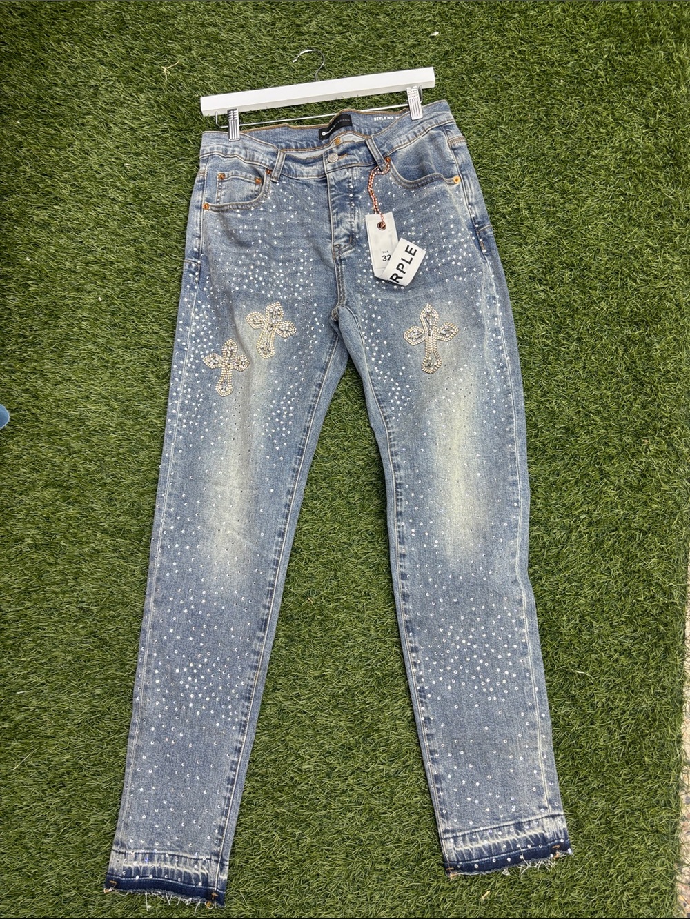 Light Blue Skinny Jeans with Crystal Cross Embellishments